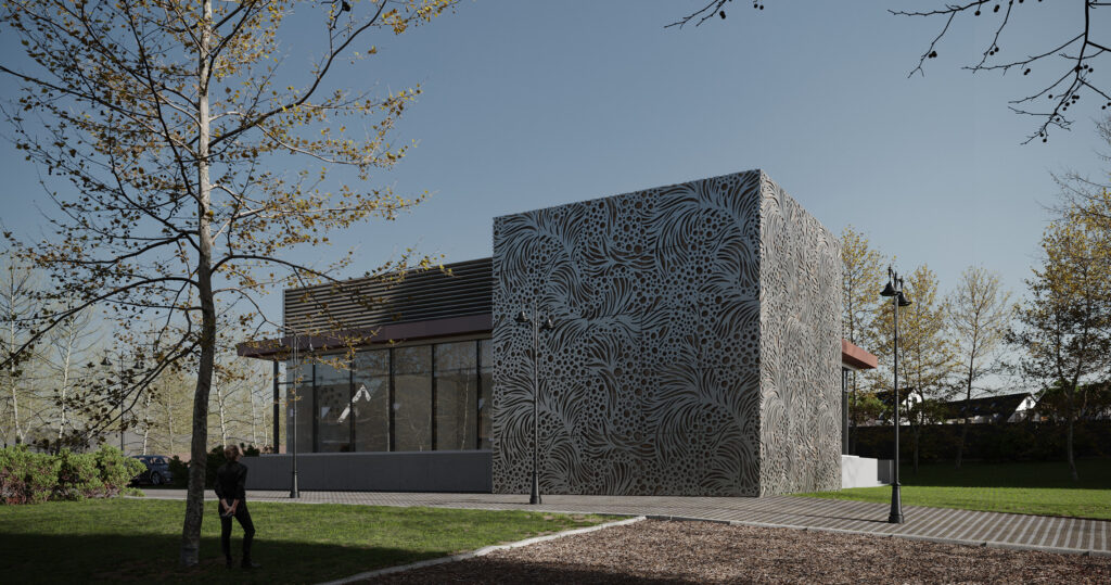 Decorative metal paneling creates intricate architectural addition to modern building