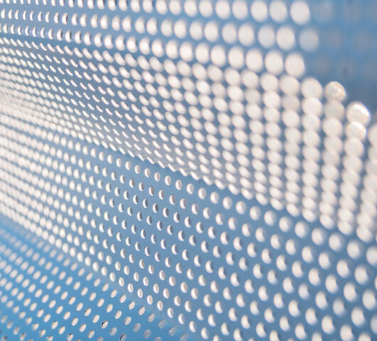 Perforated roofscreen panel cladding