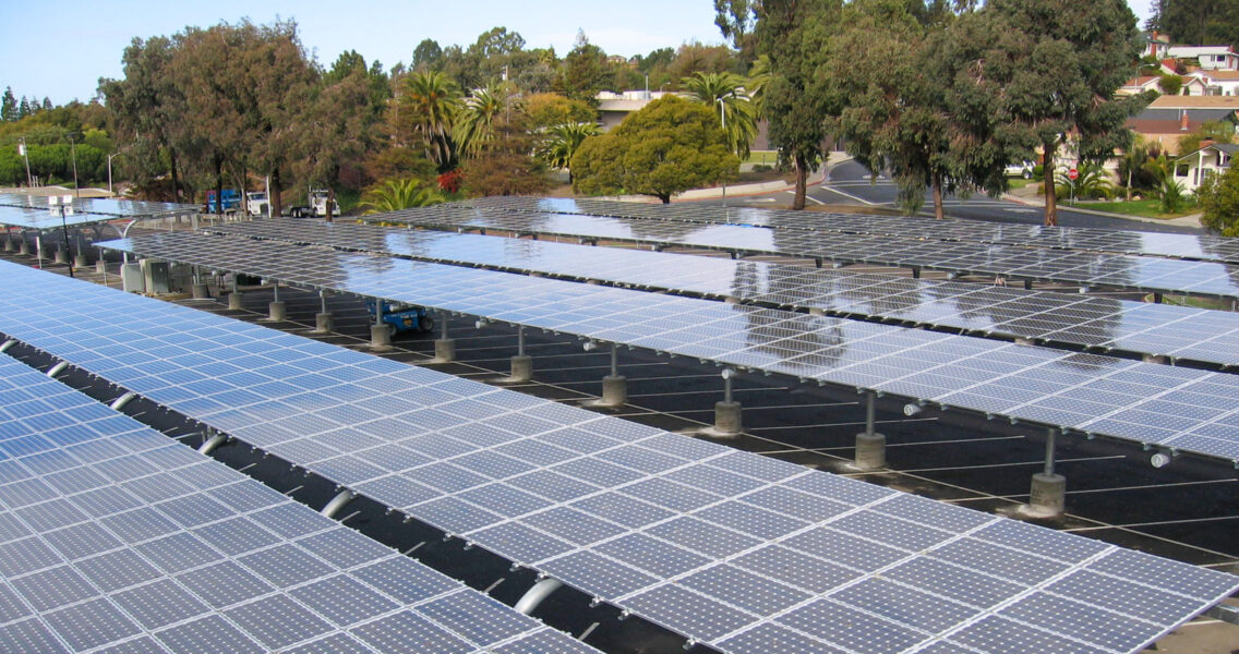 Silverback solar racking supporting solar panels doubling as shade relief in large parking lot