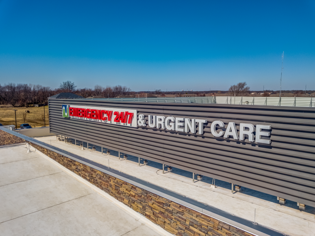 RoofScreen cladding utilized to mount building signage 